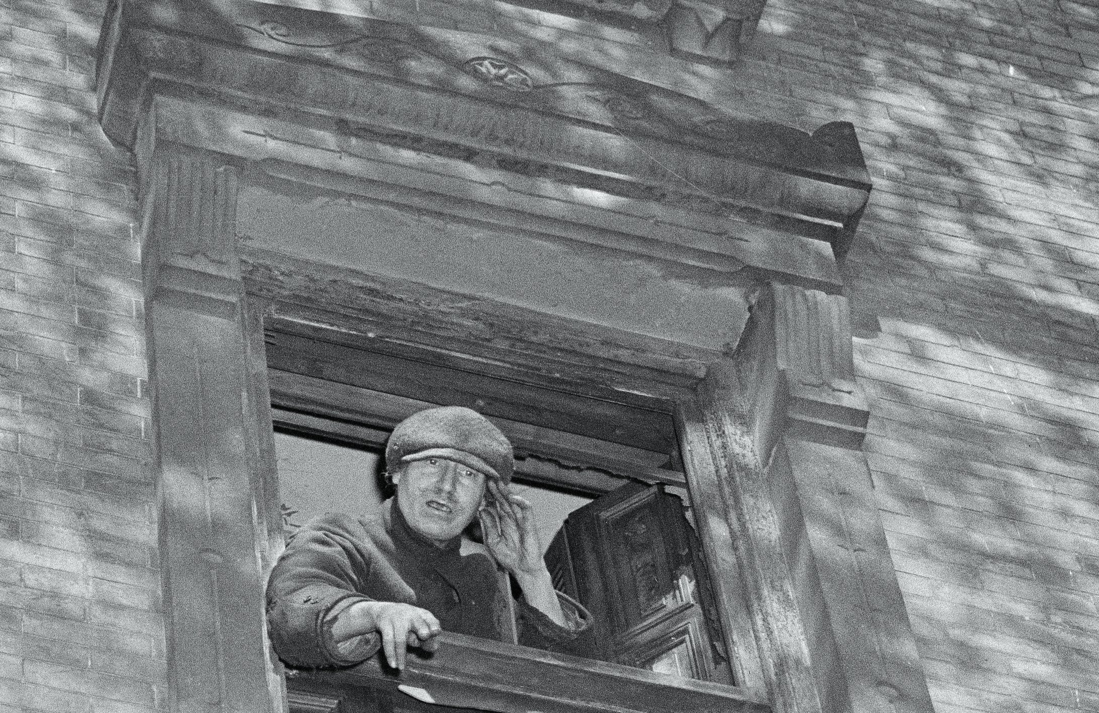 Langley Collyer Shouting from Window