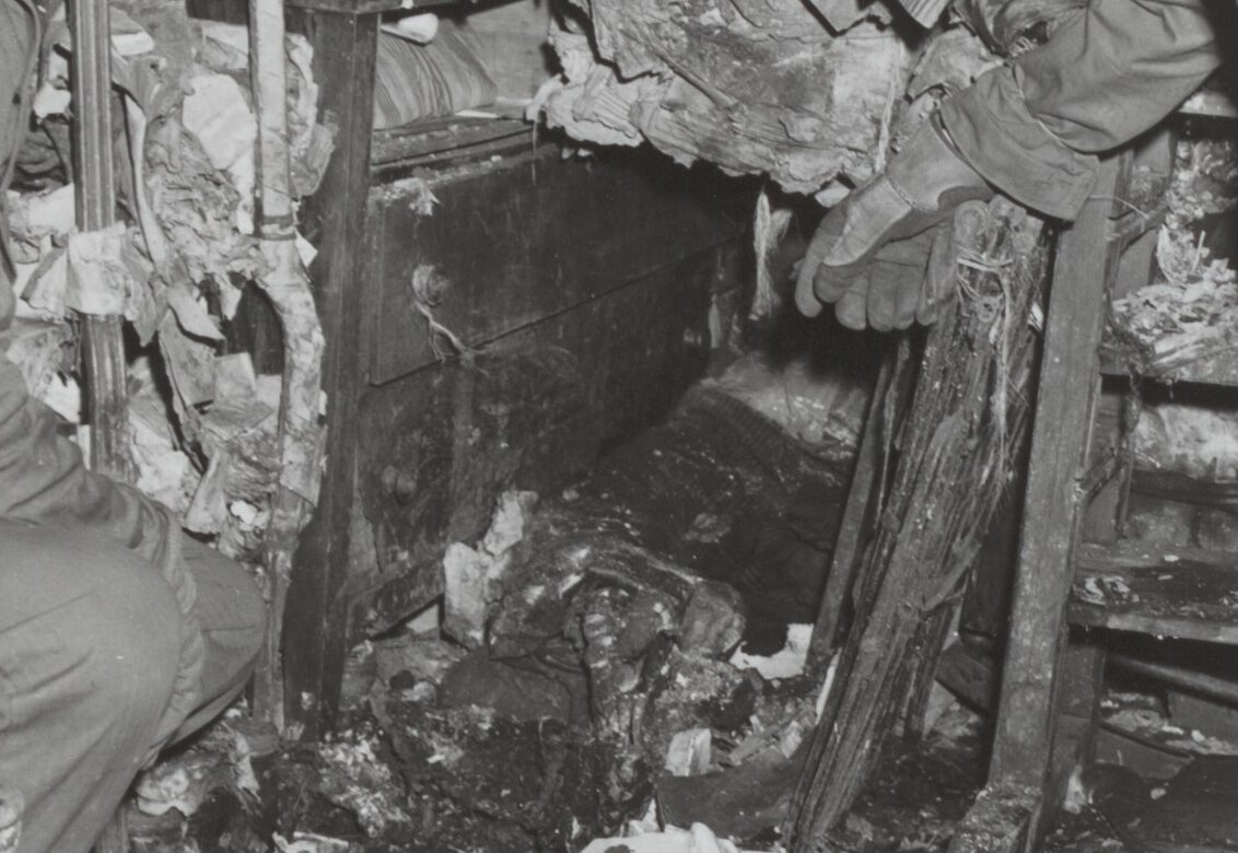 Detectives at the scene where the remains of 61-year-old Langley Collyer were found