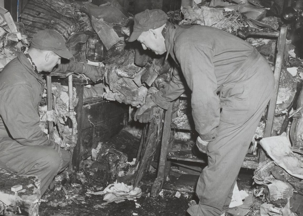 Detectives at the scene where the remains of 61-year-old Langley Collyer were found