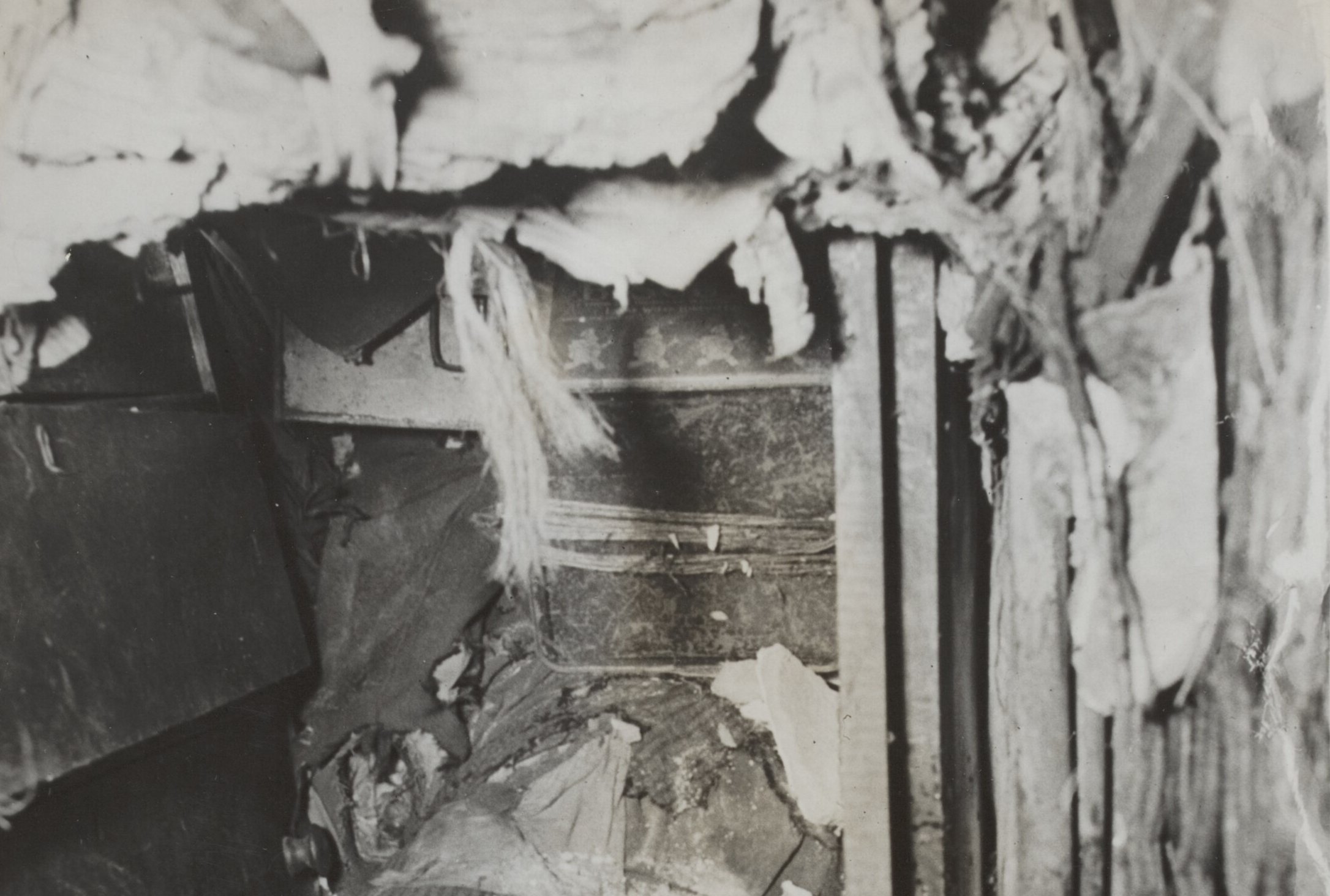In one of the many tunnels running maze-like trough bundles of old newspapers, furniture, bric-a-brac, on the second floor of the old Collyer mansion