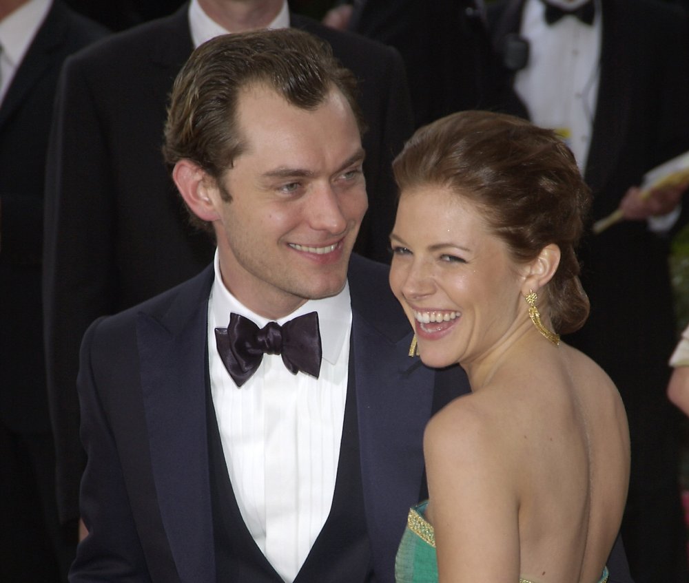 Jude Law and Sienna Miller at the 76th Annual Academy Awards