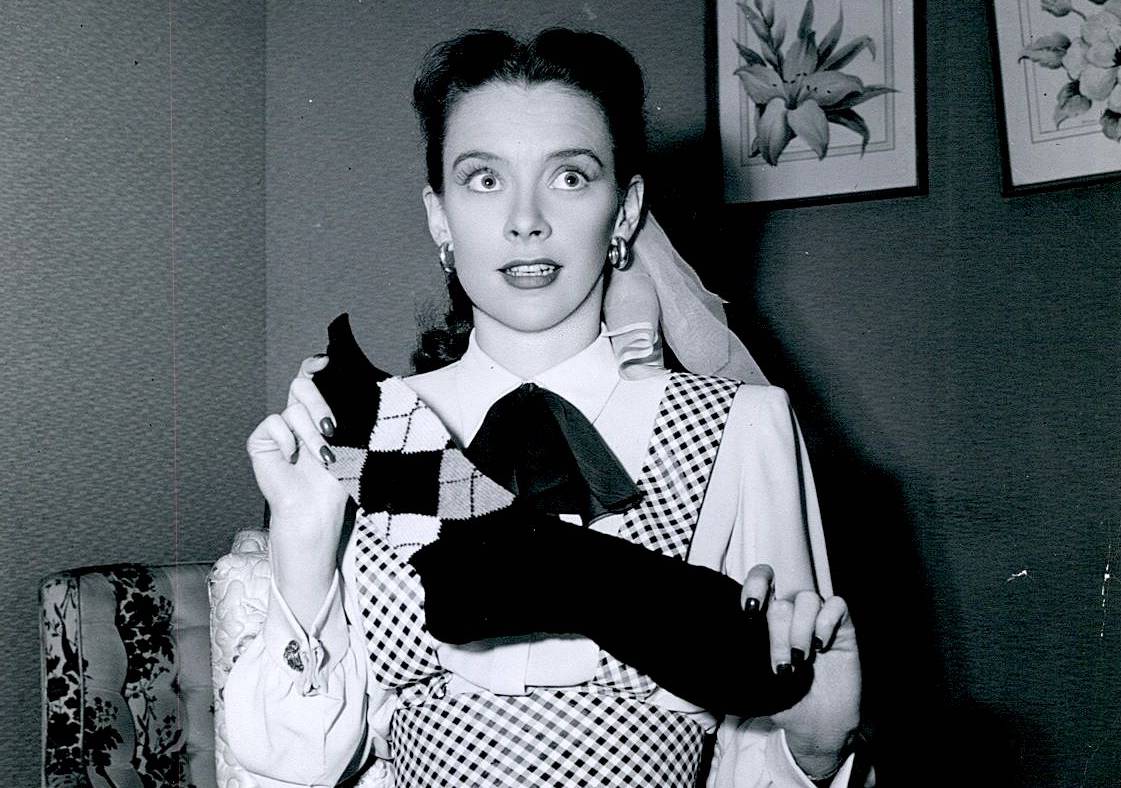 Susan Peters With Knitted Sock
