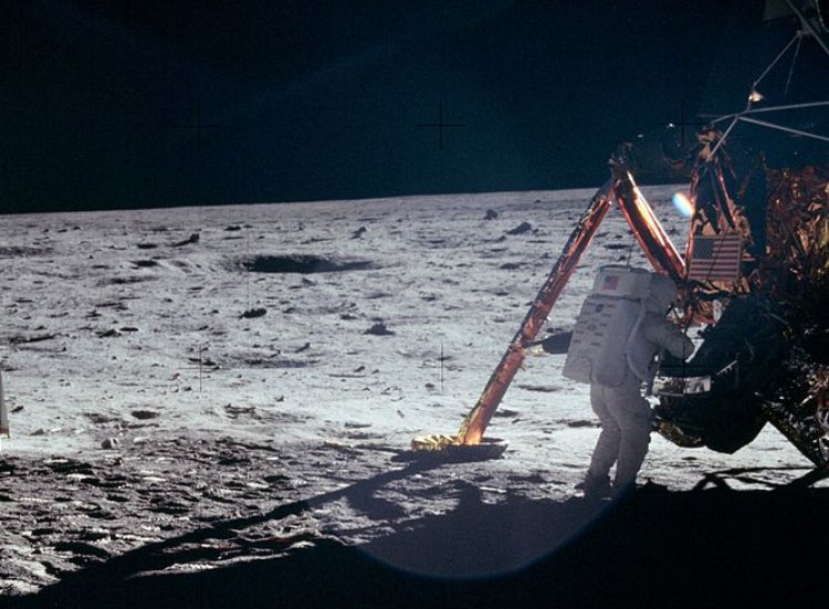 Neil Armstrong works at the LM in the only photo taken of him on the moon from the surface