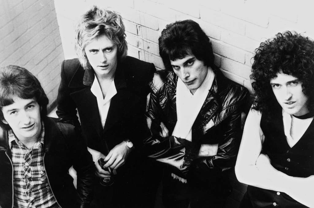 From left to right; John Deacon, Roger Taylor, Freddie Mercury, and Brian May