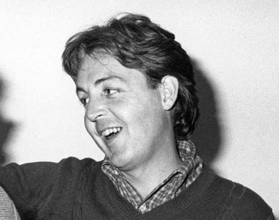 Paul McCartney share a moment of joy
