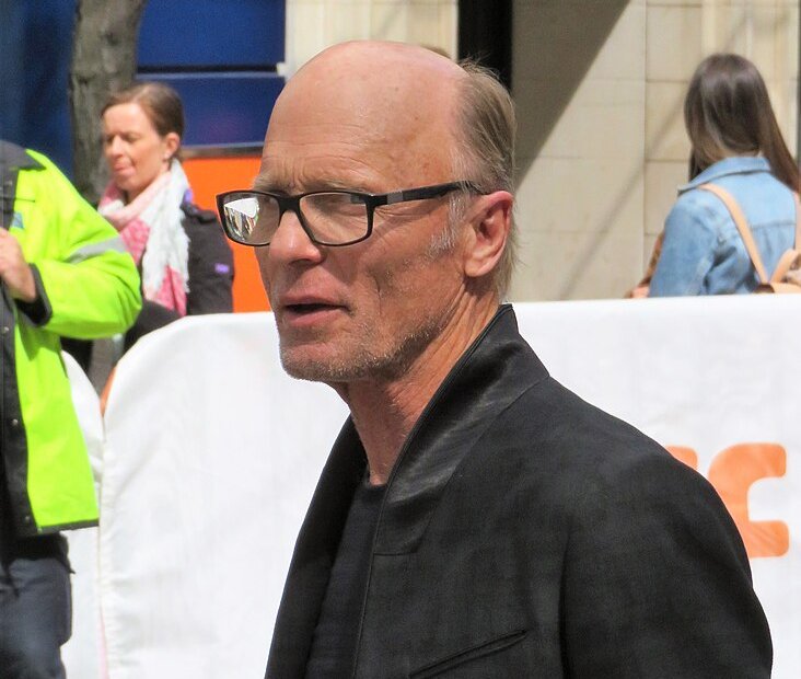 Ed Harris wearing glasses