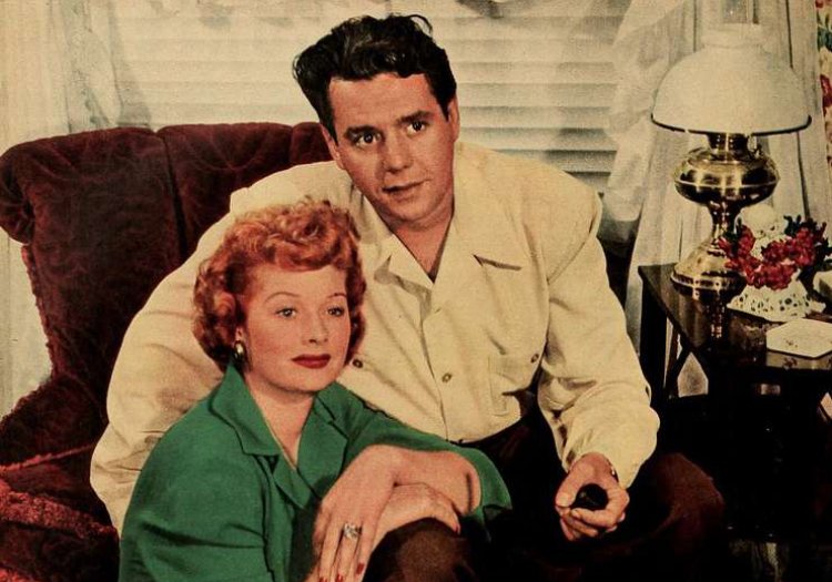 Lucille Ball and Desi Arnaz sitting