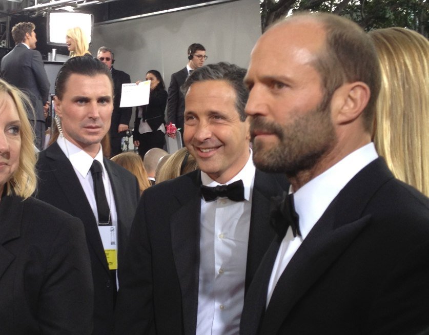 Jason Statham wearing a suit