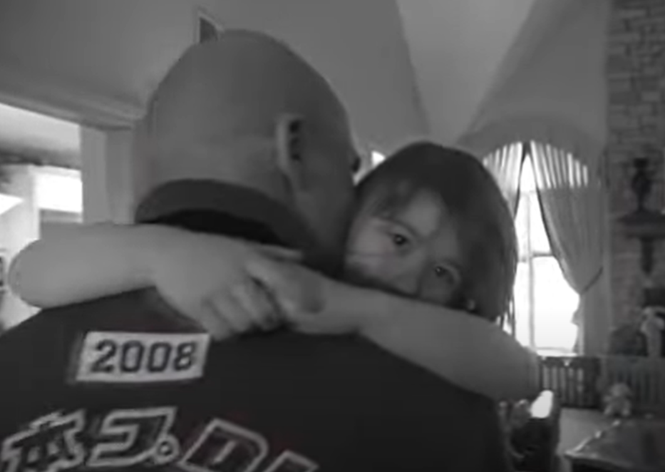 Screenshot of Kurt Angle with his daughter from - The Real Angle: The Kurt Angle Story (2009)
