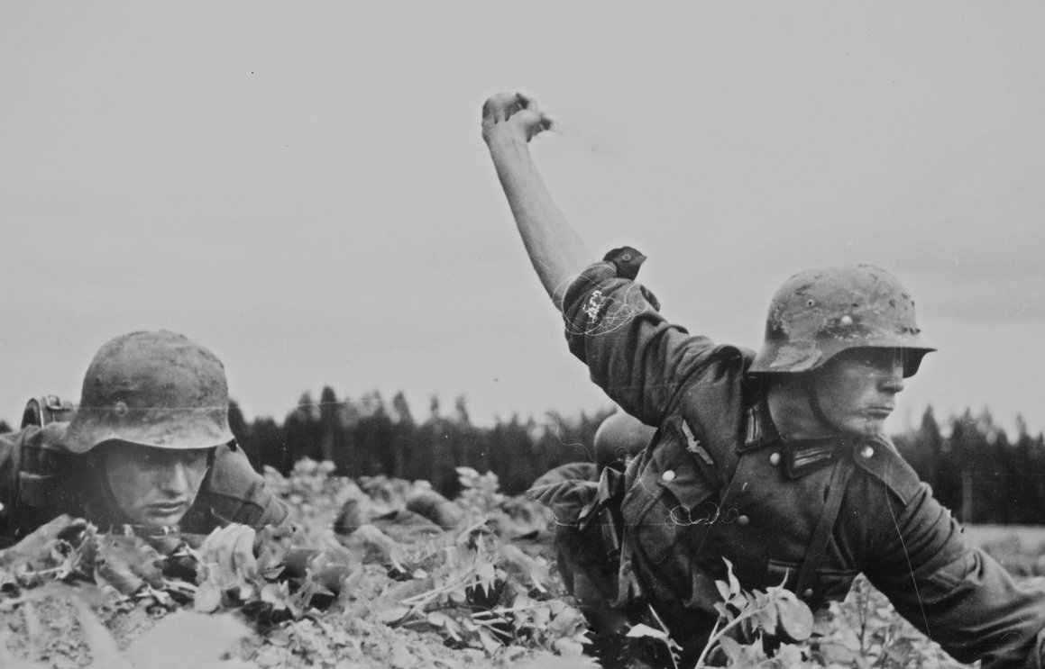 German soldier ready to throw a Stielhandgranate