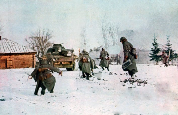 German infantrymen following a tank towards Moscow