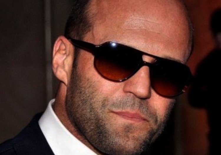 Jason Statham wearing a pair of sunglasses