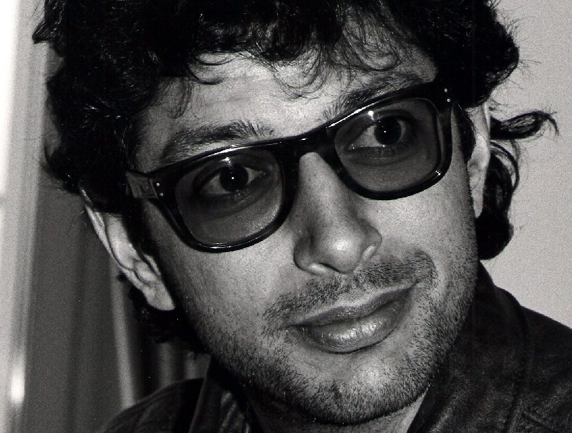 Grayscale Portrait Photo of American actor and musician Jeff Goldblum