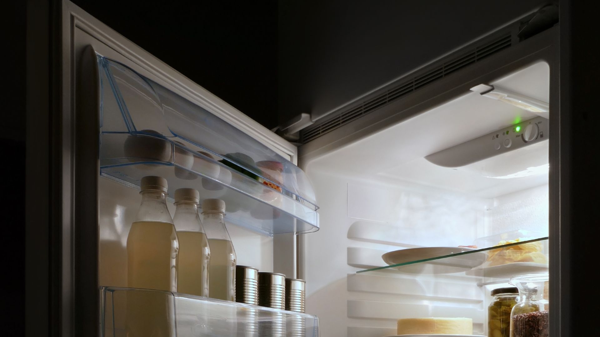 File:Open refrigerator with food at night.jpg