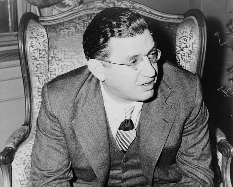 David O. Selznick, three-quarter length portrait, seated, facing right