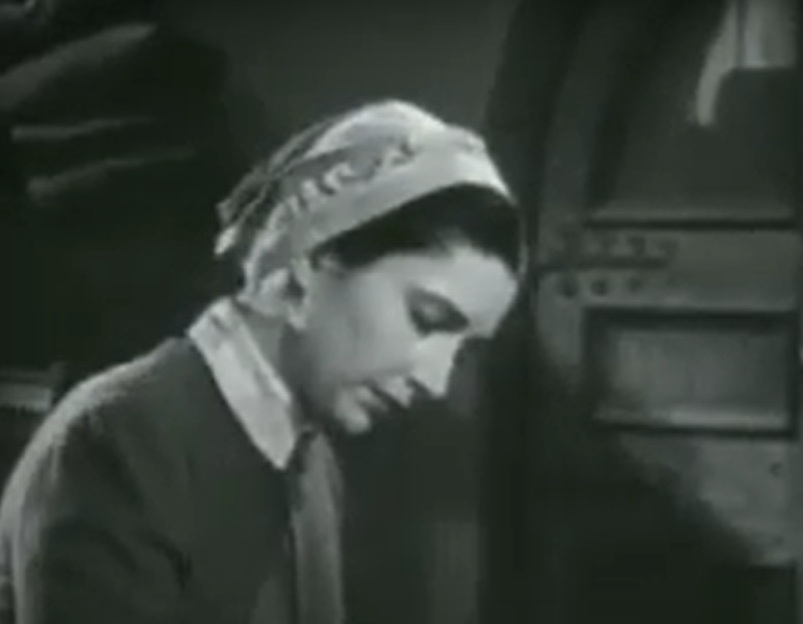 A visually captivating still taken from a pivotal moment in the film The White Angel (1936)