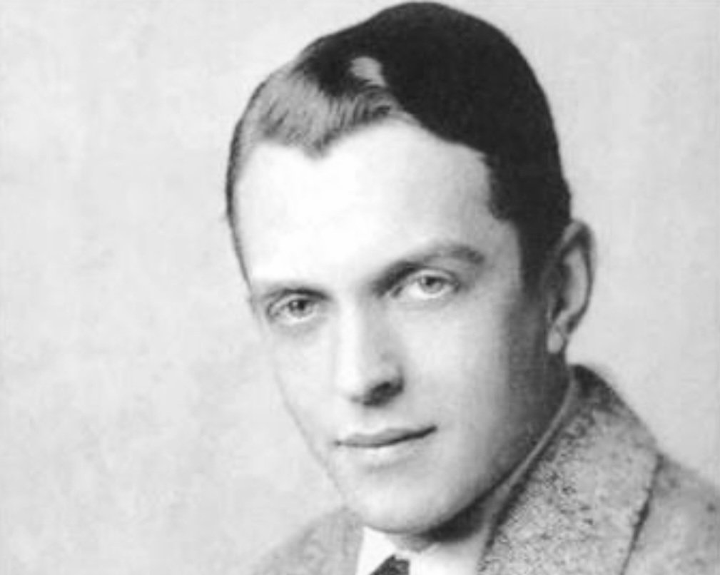 Grayscale Portrait Photo of American actor and film director Kenneth Mackenna