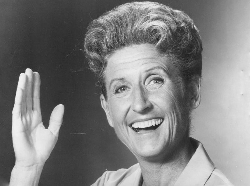 Publicity photo of American actress, Ann B. Davis waving
