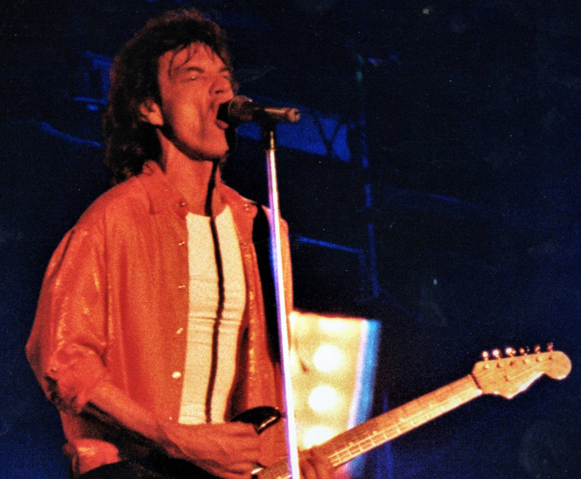 Mick Jagger performing