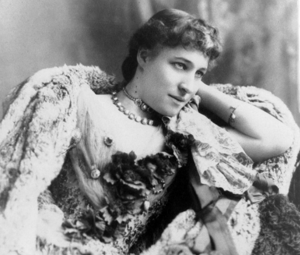 Lillie Langtry posing for a photo in a dress