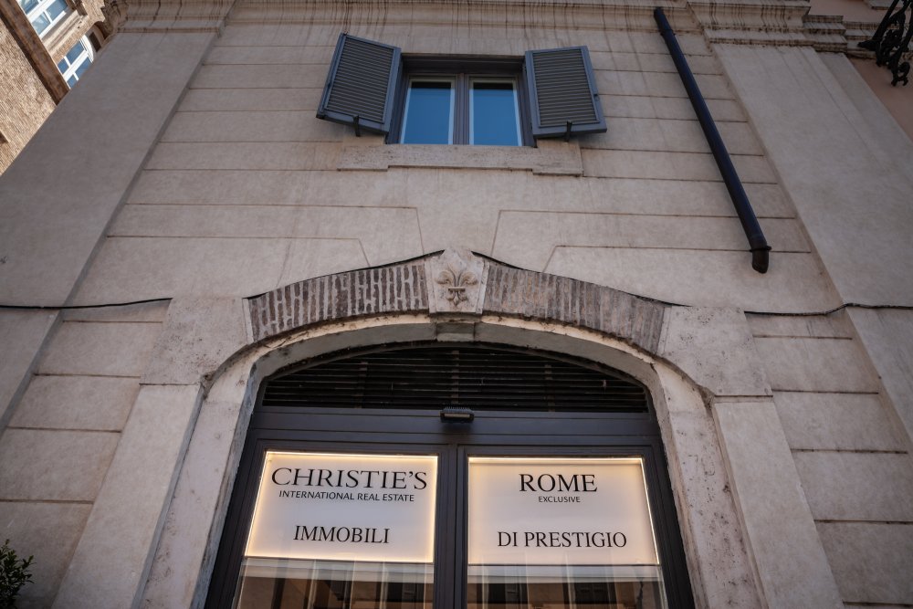 Christie's International Real Estate window signage in Rome