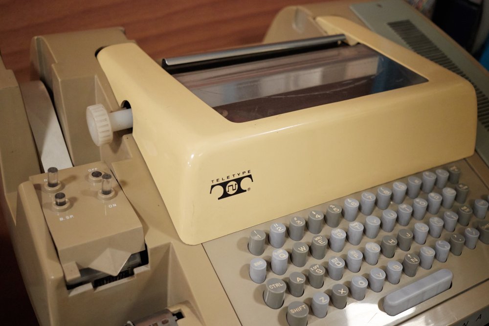 Close Up Photo of Old teletype machine placed on a table