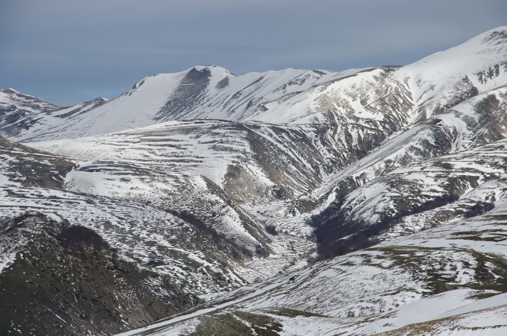 Panoramic view of national park of the sibillini mountains covered by snow