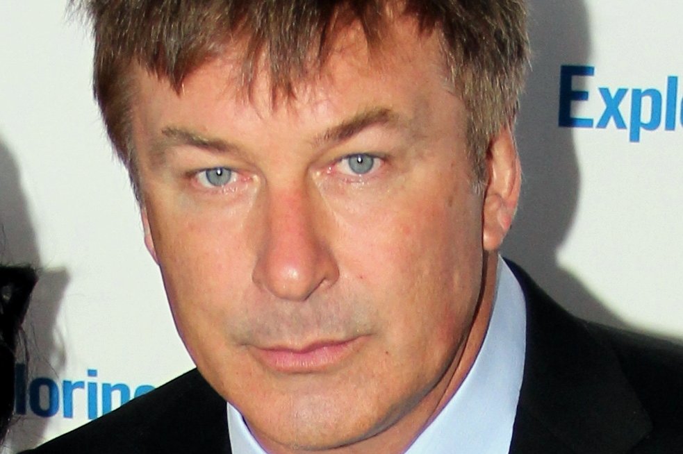 Alec Baldwin wearing a suit