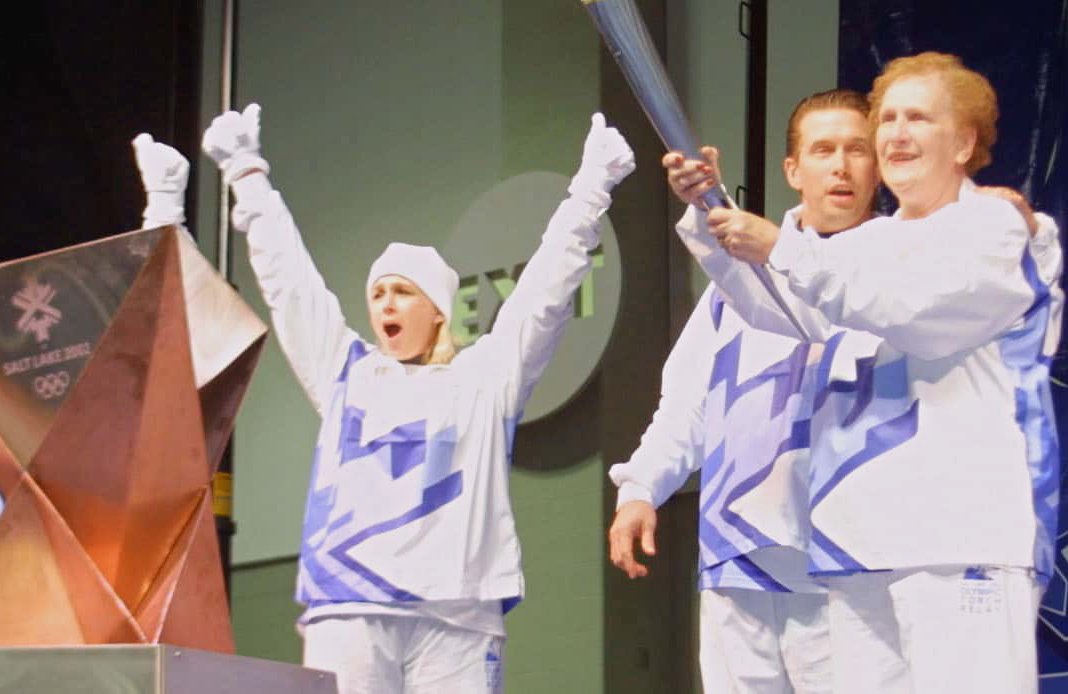 Torchbearer Carol Baldwin, along with children Stephen, Jane and Beth