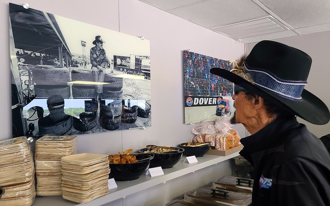 Richard Petty Looks At Photo Of Himself At Dover Speedway