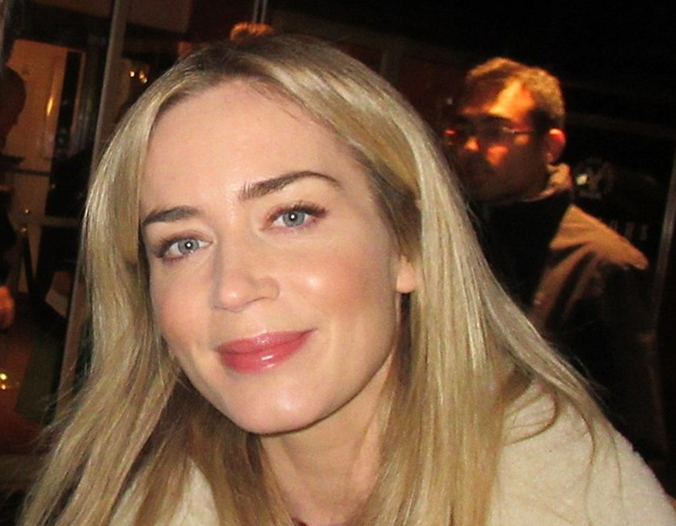 Emily Blunt smiling at camera.