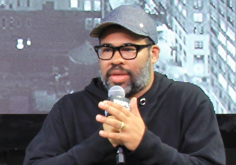 Jordan Peele speaking at a conference