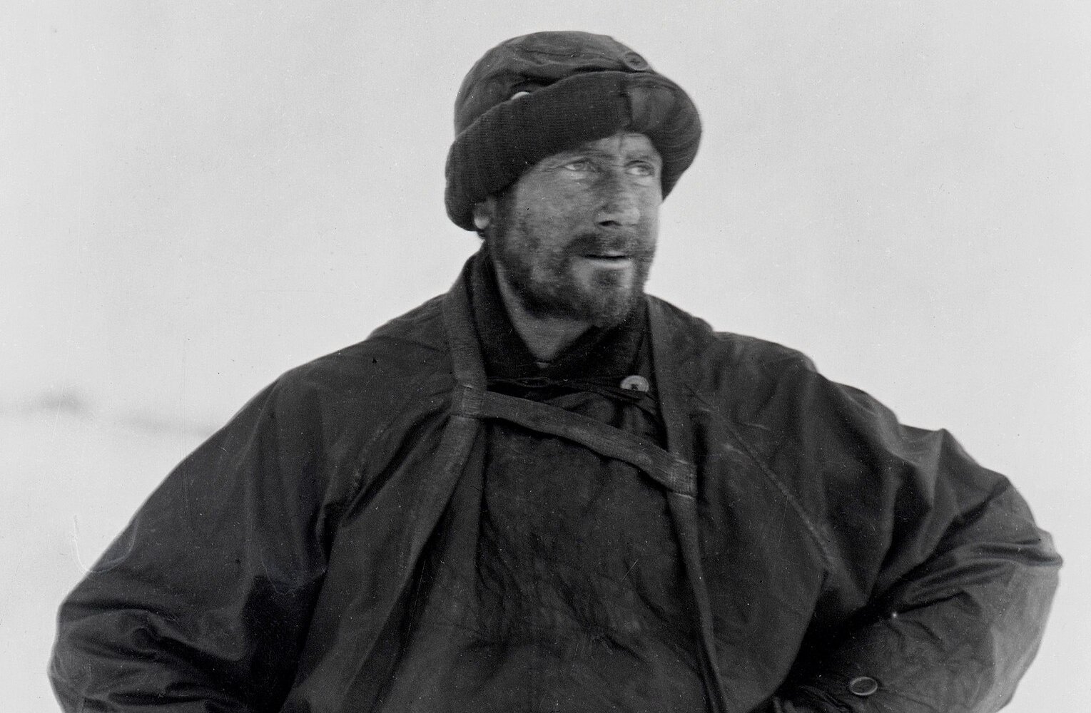 Robert Falcon Scott photographed at the South Pole, in a sturdy pose and dressed in thick and warm clothing