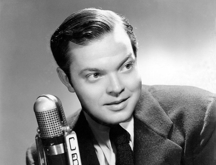 Portrait photograph of Orson Welles, promoting the premiere broadcast