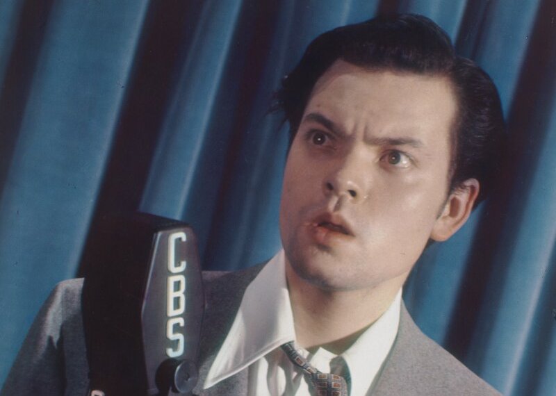Color portrait photograph of Orson Welles on the cover of the New York Sunday News