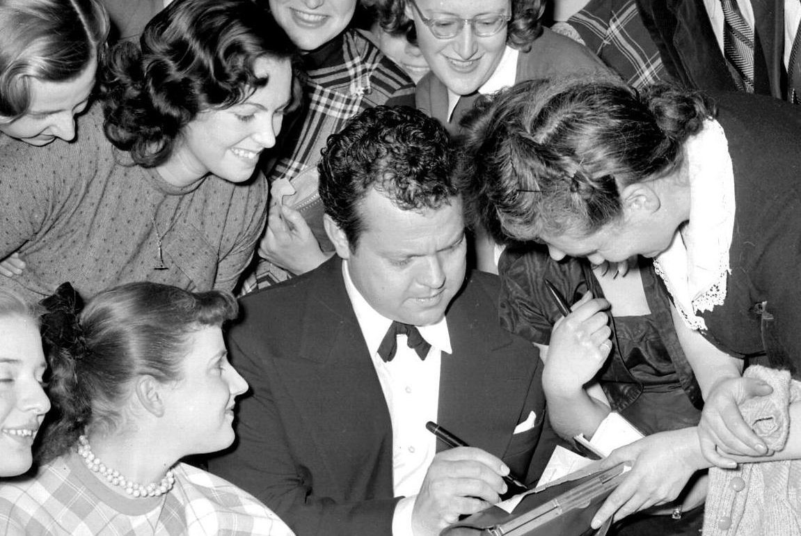Orson Welles among admirers in the Concertgebouw, Amsterdam