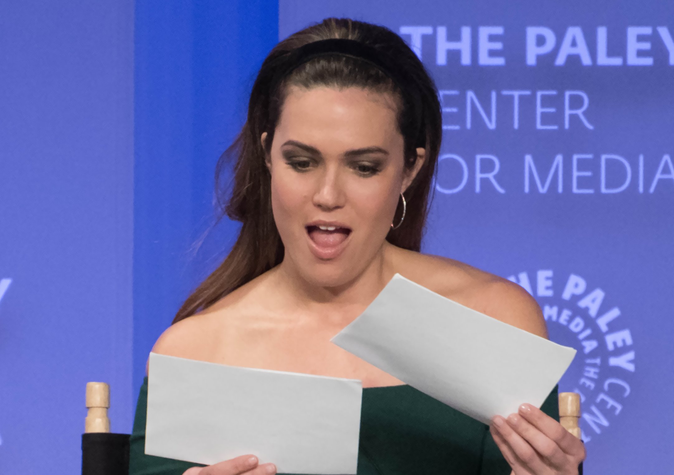 Mandy Moore wearing a green top