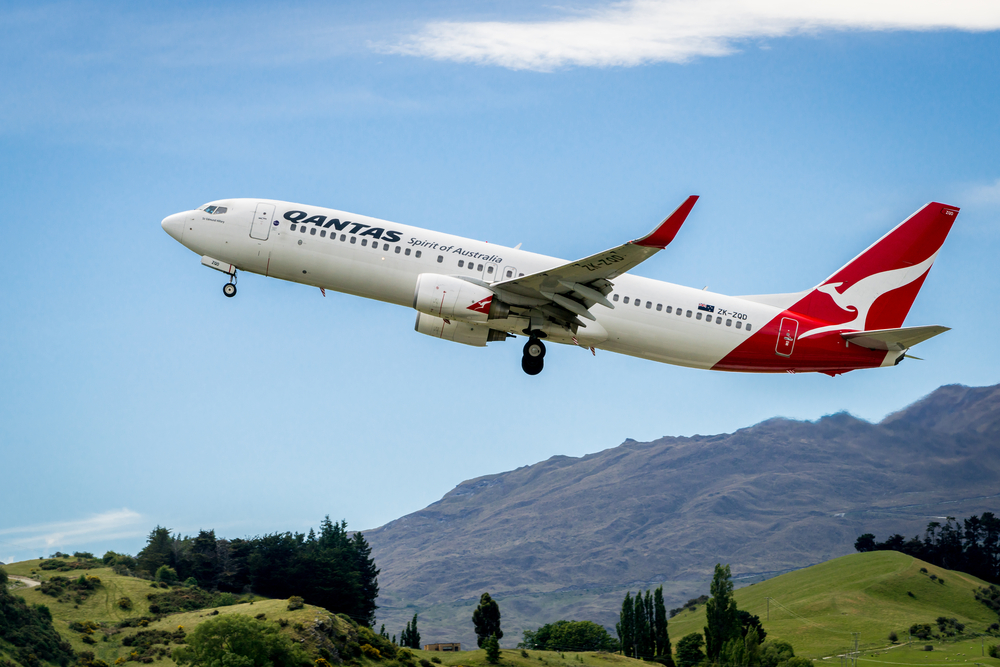 Airplane of Qantas Airways takes off