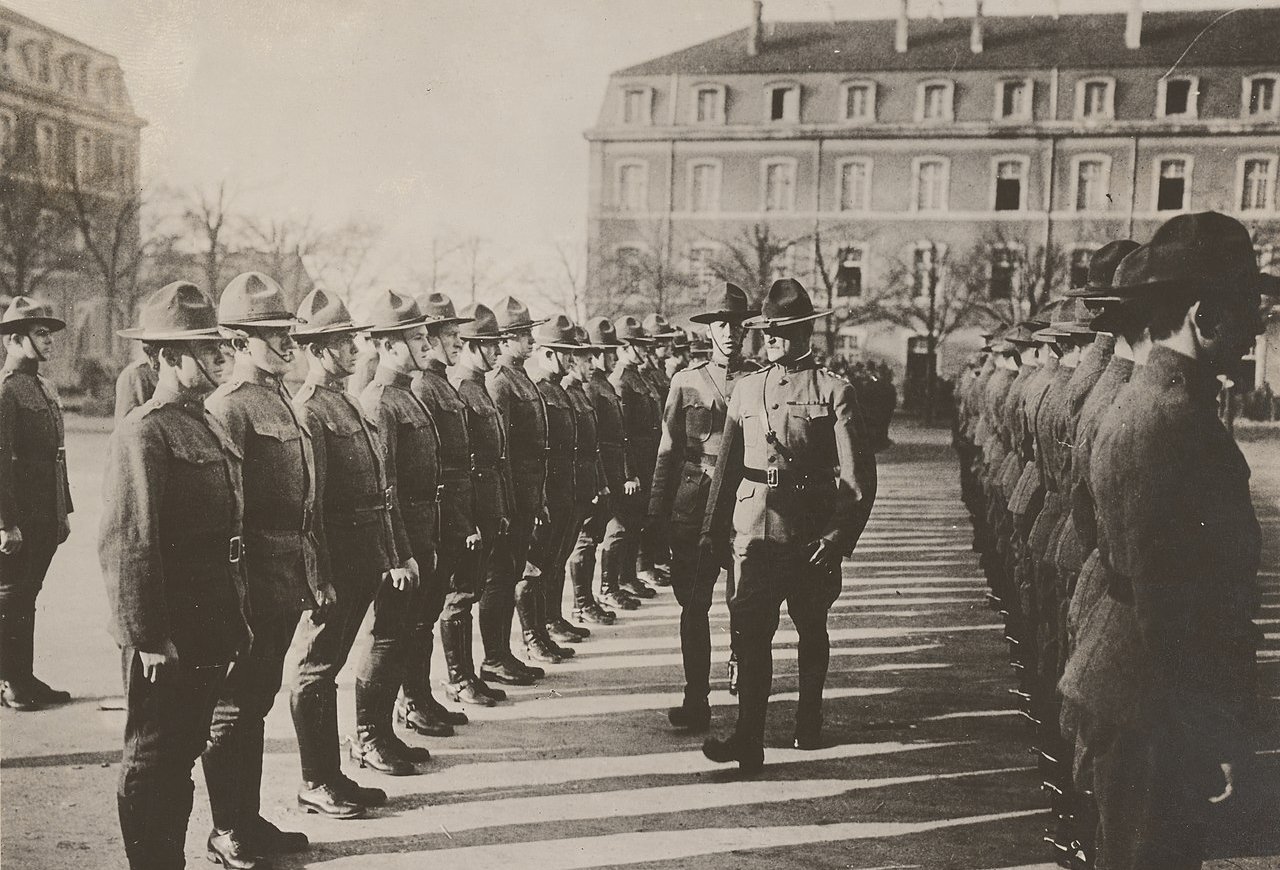 Major General John J. Pershing, accompanied by Captain George S. Patton, inspecting men of Patton's headquarters troop