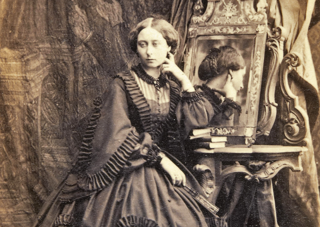 Princess Alice of the United Kingdom posing near a mirror