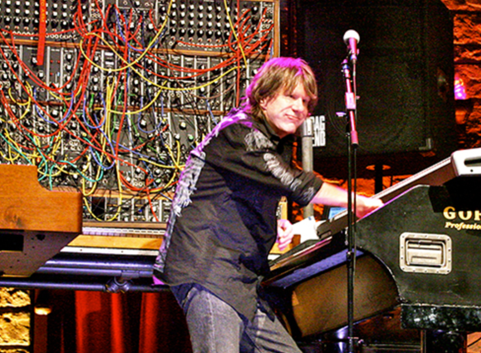 Keith Emerson performs on his Hammond and Moog synthesizer