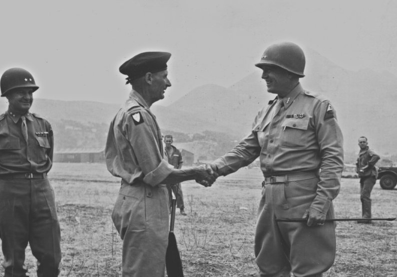 General Sir Bernard Montgomery shakes hands with Lieutenant General George S. Patton