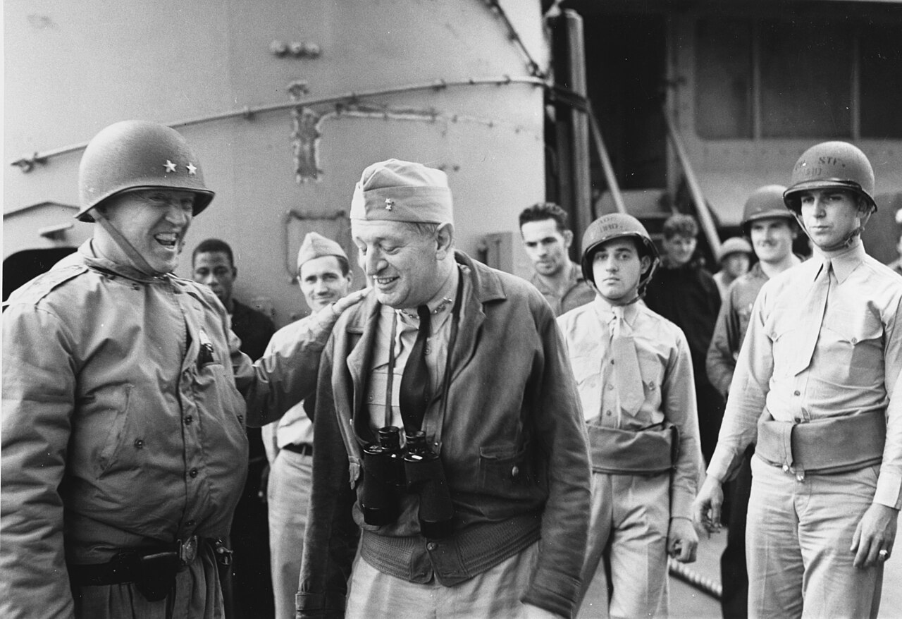 Patton (left) with Rear Admiral Henry Kent Hewitt aboard USS Augusta