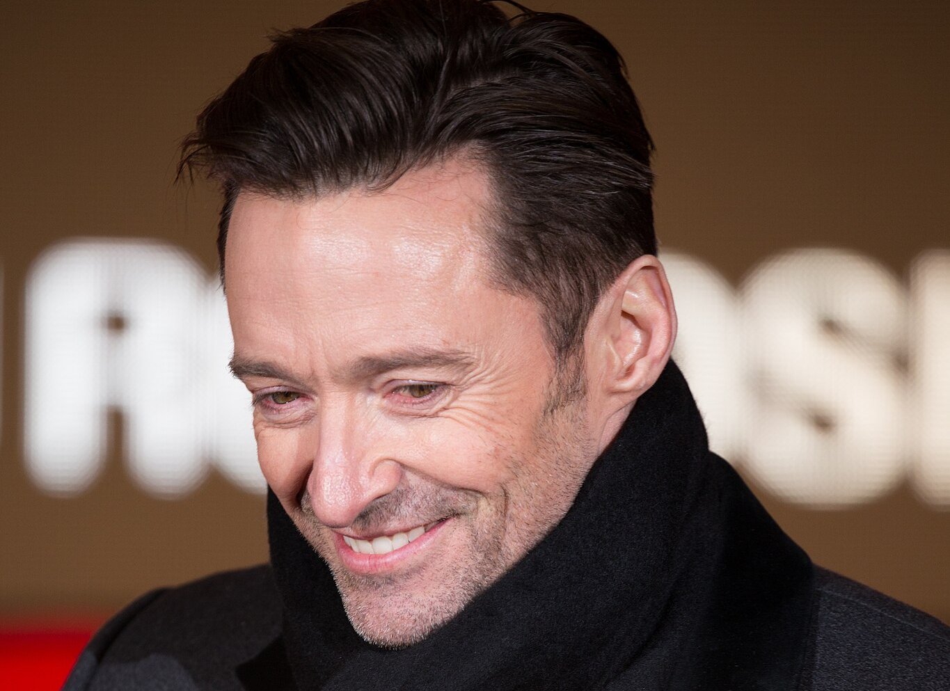 Hugh Jackman wearing black scarf