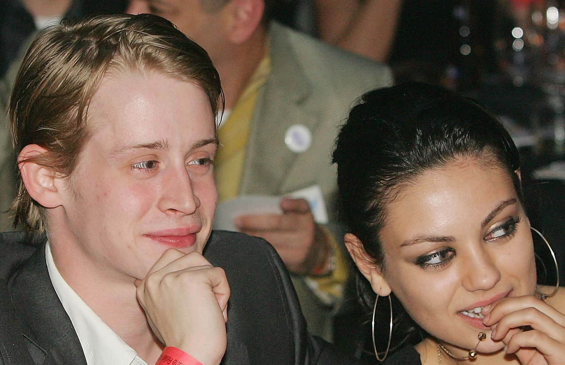 Actor Macaulay Culkin (L) and actress Mila Kunis