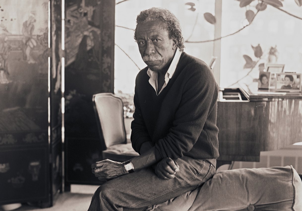 Gordon Parks next to his piano, late 1980s