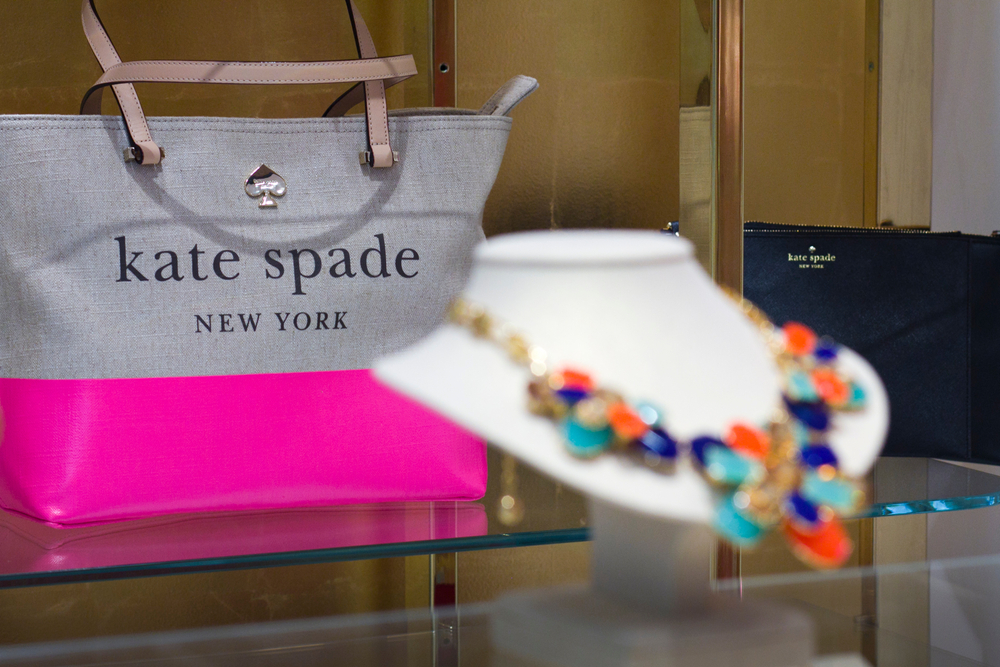 Kate Spade purses and necklace photographed at a store during the presentation of the Rio Collection