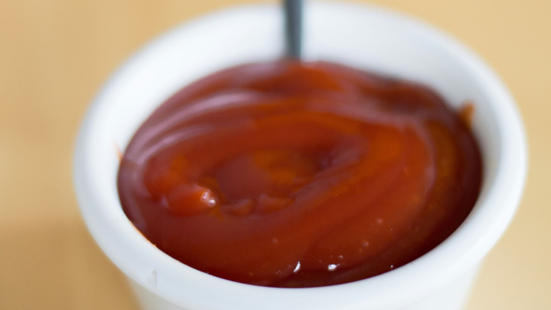 white ceramic mug with brown liquid