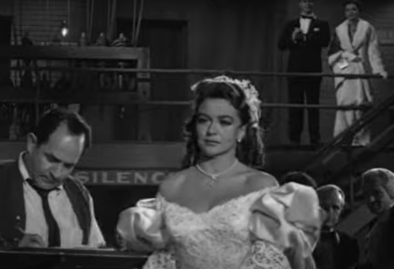 A screenshot of the movie Too Much, Too soon