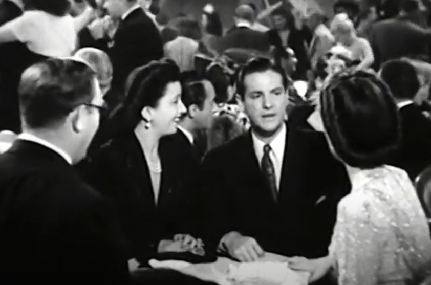 A screenshot of the movie Between Us Girls